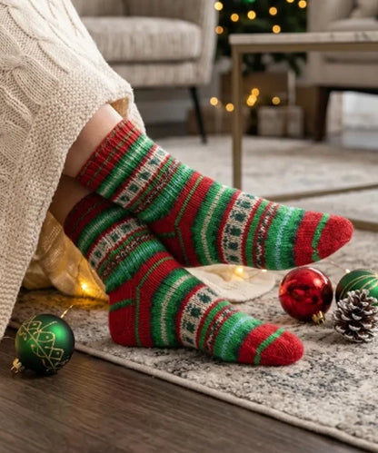 Sfeerfoto kerstsokken gebreid met Rellana Flotte Socke Christmas 2026 6-ply