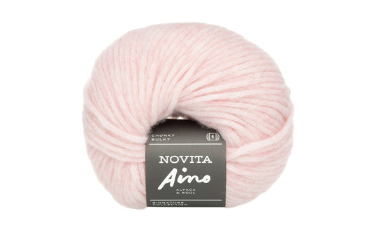 Novita Aino breigaren in tinge - innovatieve blow wool techniek voor luchtige structuur